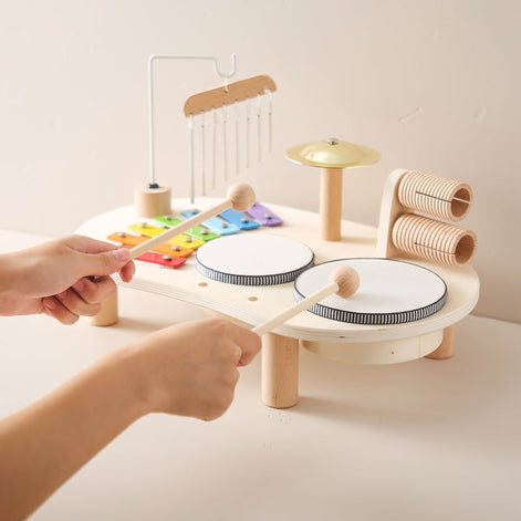 Sonvara Kinder Musikspielzeug Tisch mit Xylofon und Trommeln