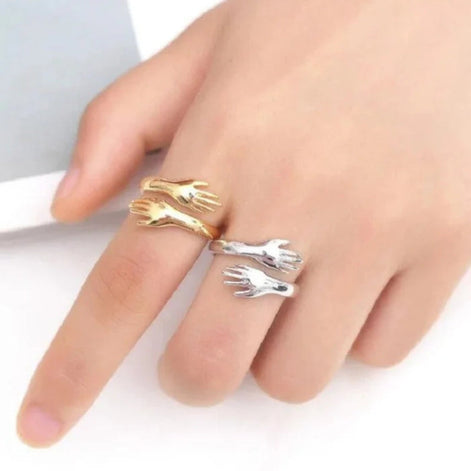 Handoria Damenring mit verschlungenem Handdesign und offener Form