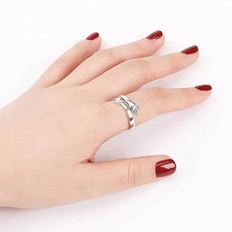 Handoria Damenring mit verschlungenem Handdesign und offener Form