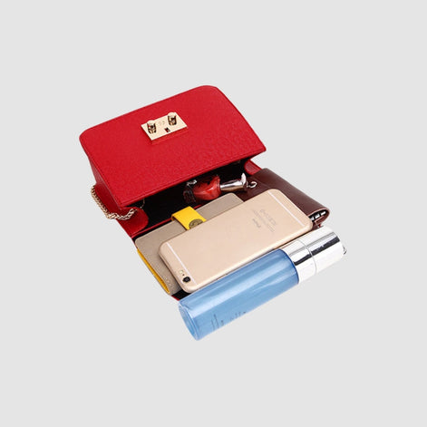 Norevia Mini Schultertasche leicht und pflegeleicht mit Kettendetail und kompaktem Innenfach