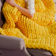 La Maille Majestueuse – Gestrickte Wohndecke für Sofa und Bett