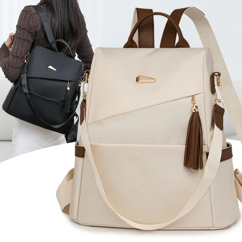 Tasselora Damen Anti-Diebstahl Rucksack aus Nylon mit Quasten-Detail