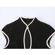 Élodine Damen Minikleid mit Kontrastdetails und Cut-out Design