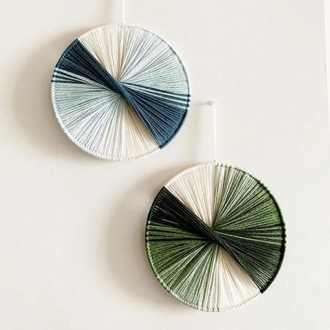 Wandkunst aus Baumwollfäden mit kreisförmigem Design
