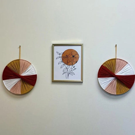 Wandkunst aus Baumwollfäden mit kreisförmigem Design
