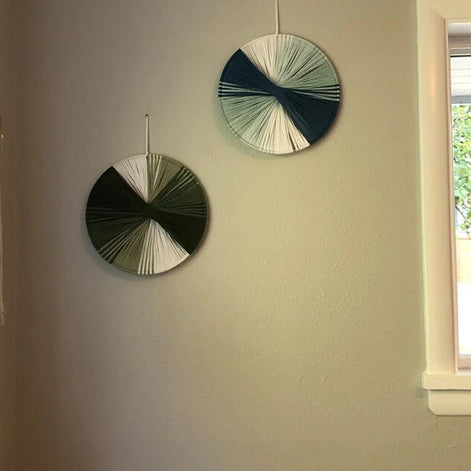 Wandkunst aus Baumwollfäden mit kreisförmigem Design