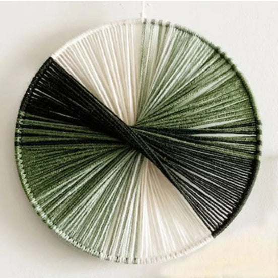 Wandkunst aus Baumwollfäden mit kreisförmigem Design