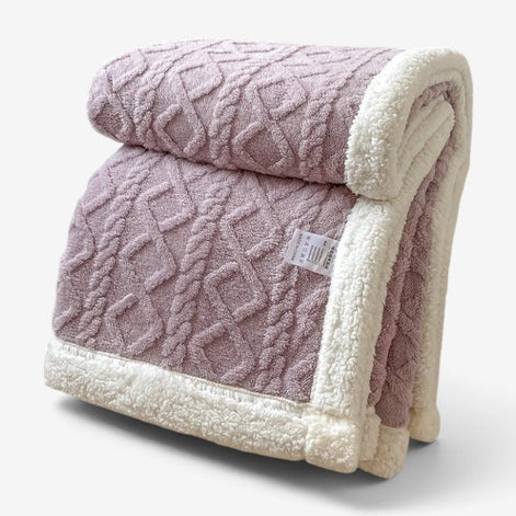 Wendbare Fleecedecke mit Muster in verschiedenen Farben und Größen – Velanora